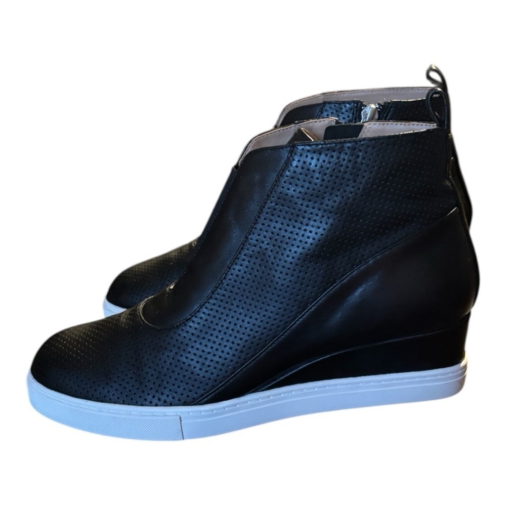 Linea Paolo Archer Leather Wedge Black and White Sneakers with High-Top Design.